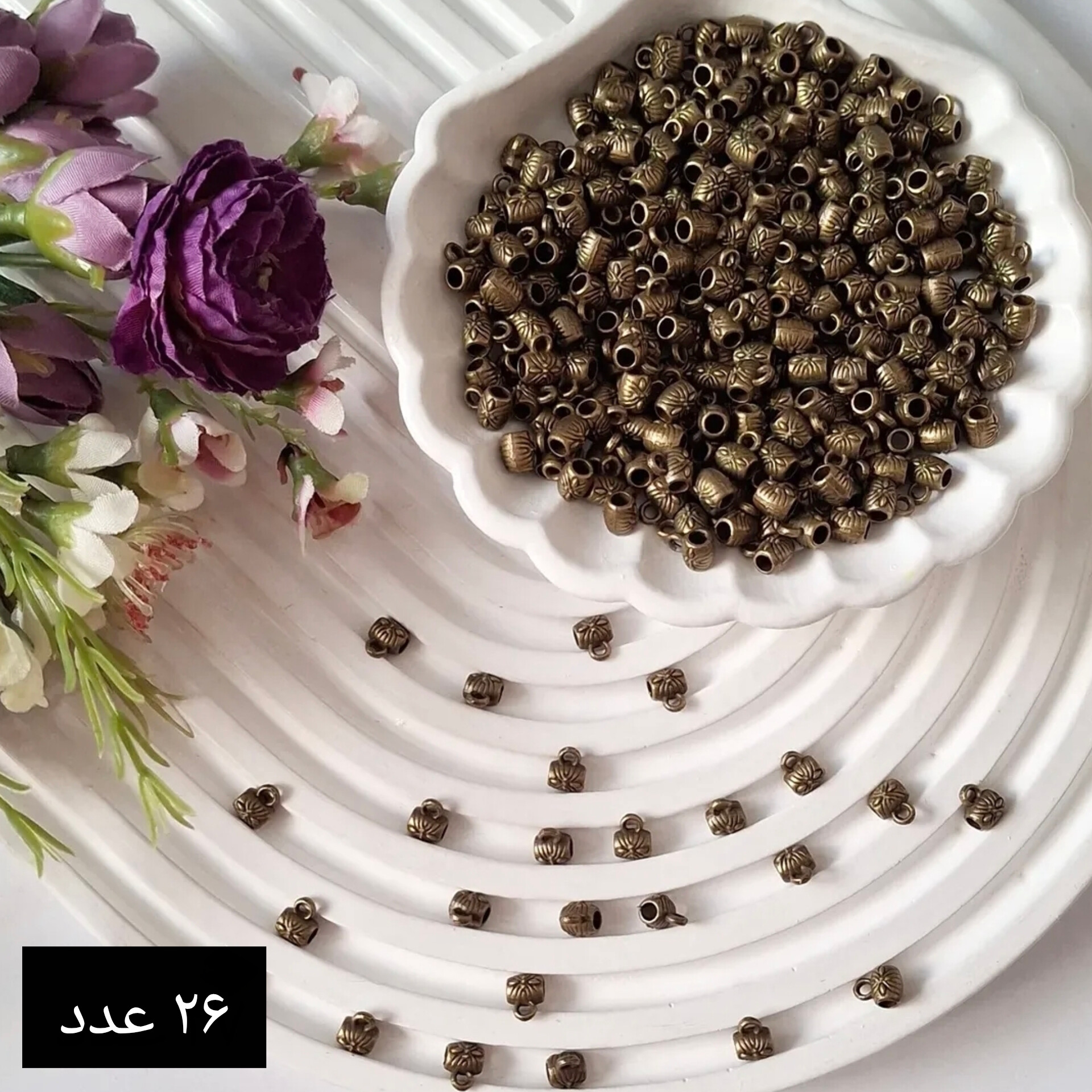 پاپیون آویزی برنزی (فروش بصورت بسته های ده گرمی)